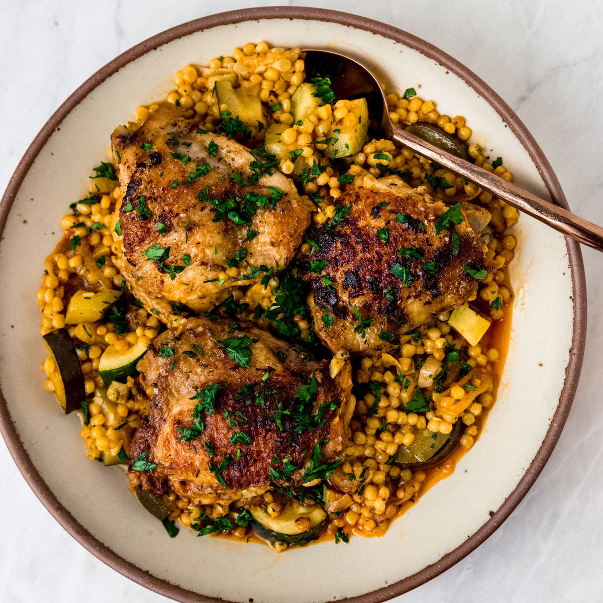 Garlic-Lemon Chicken with Saffron Pearl Couscous and Zucchini – Burlap & Barrel