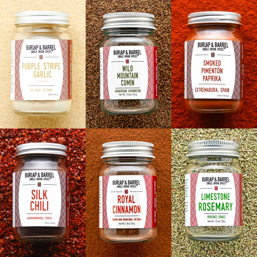 Collage of Burlap & Barrel spice jars with labels on a textured background