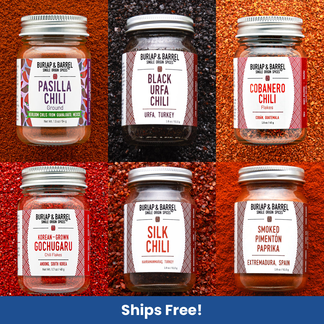 Collage of Burlap & Barrel chili jars with labels on a textured red and black background.