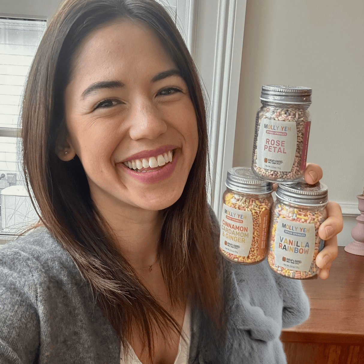 Molly Yeh hold spiced sprinkles