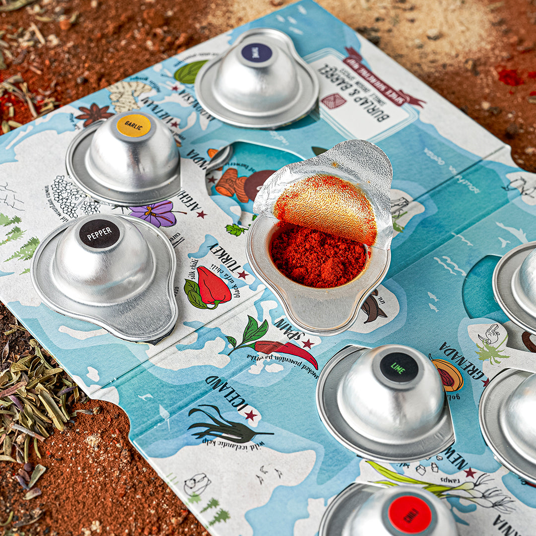 Spice passport with 1/2 tsp spices in each pod