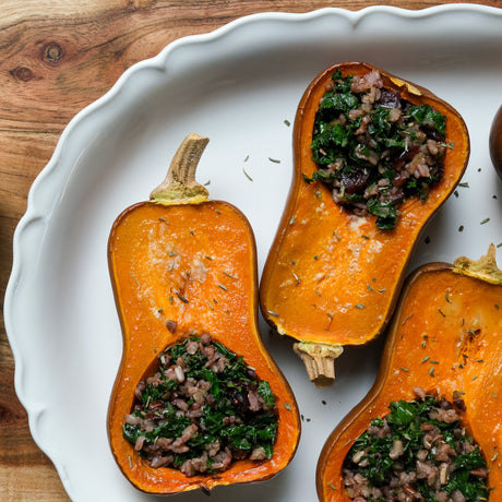 Squash Stuffed with Farro, Chard & Dried Cranberries