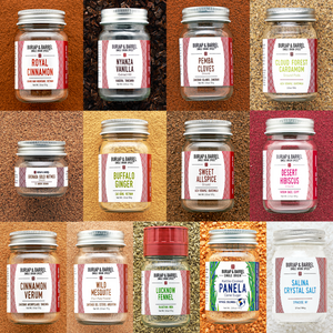 12 Spice Baking Collection with Royal Cinnamon, Nyanza Vanilla Extract Kit, Ground Pemba Cloves, Cloud Forest Cardamom, Ground Grenada Gold Nutmeg, Buffalo Ginger, Ground Sweet Allspice, Ground Desert Hibiscus, Cinnamon Verum, Wild Mesquite, Lucknow Fennel in a grinder, Panela Cane Sugar and Salina Crystal Salt