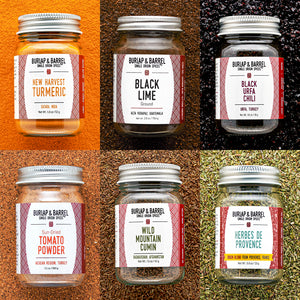 Collage of Burlap & Barrel spices with labels on an orange, black, brown, and green background.
