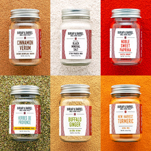 Collage of Burlap & Barrel spice jars with labels on a multicolored background