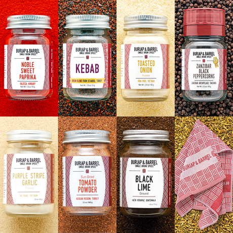 7 spice grilling set from Burlap & Barrel with Noble Sweet Paprika, Kebab, Toasted Onion, Zanzibar Black Peppercorns, Purple Stripe Garlic, Sun-Dried Tomato Powder, Black Lime and our Woven Kitchen Towels