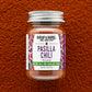 Jar of Burlap & Barrel Pasilla Chili on a textured brown background