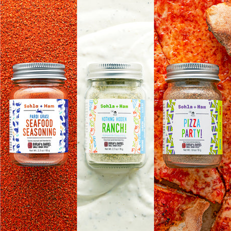 Three jars of Sohl & Ham seasoning on a pizza, bread, and ranch background
