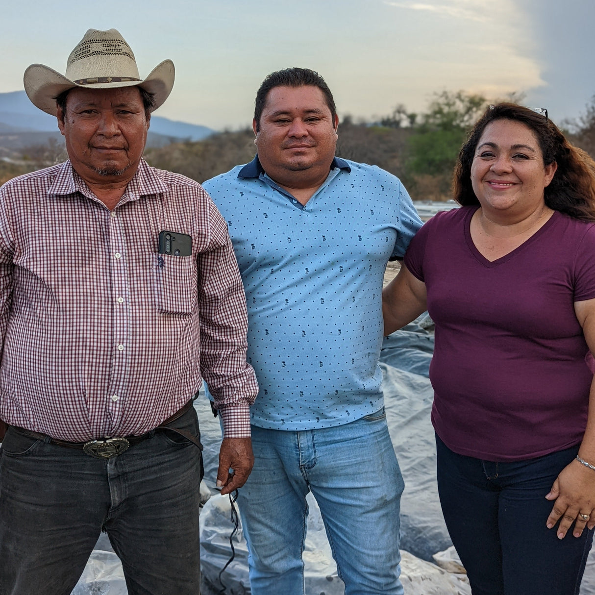 Emilio, Jonathan and Cecilia, who run the black lime drying facility in Alta Verapaz, Guatemala