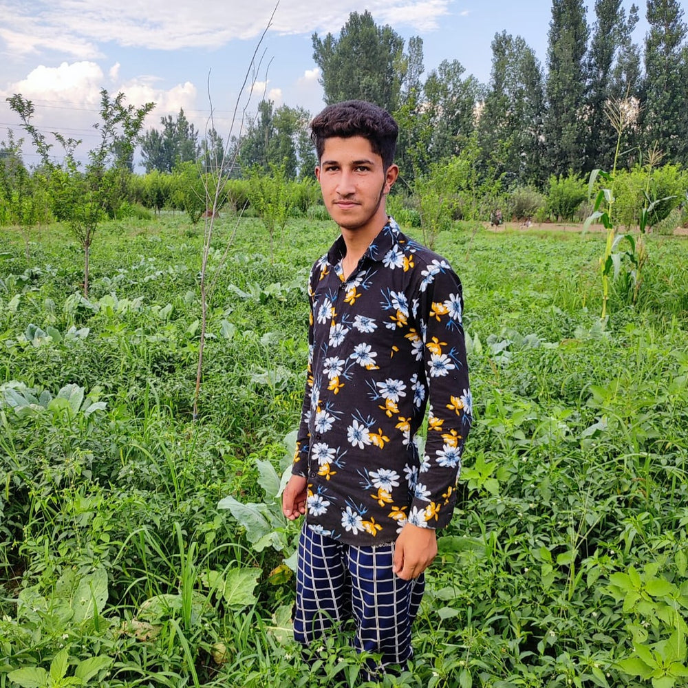 Partner Farmer, Mohsin in Kashmiri Chili field - Burlap & Barrel