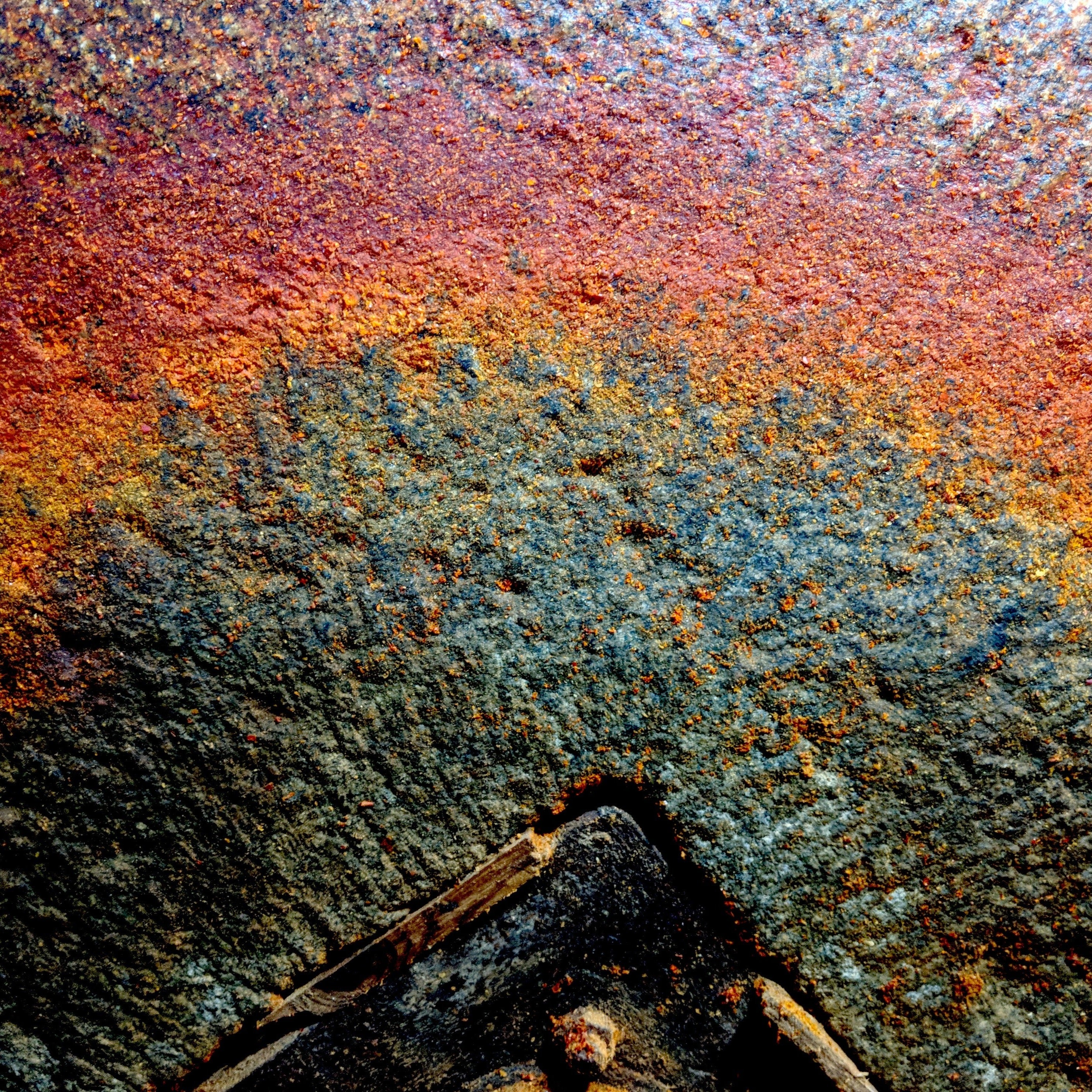Stone wheel that grinds Burlap & Barrel Silk Chili